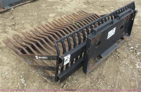 rake bucket skid steer|rock rake for skid steer.